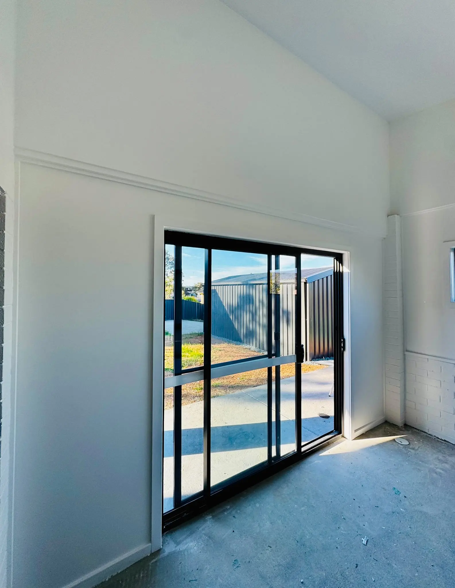 Interior vaulted ceiling and sliding door painted in Belconnen